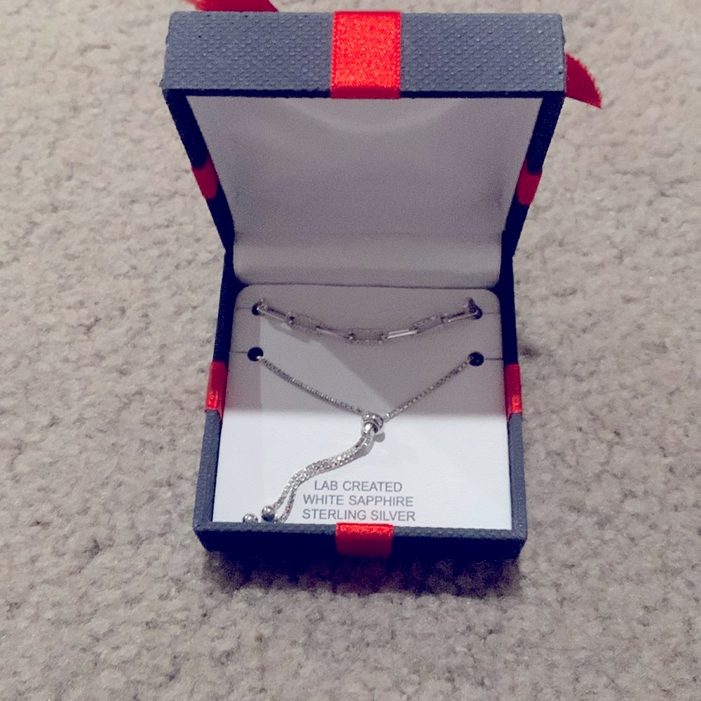 New set of bracelets-one white sapphire & one sterling silver MSRP $130